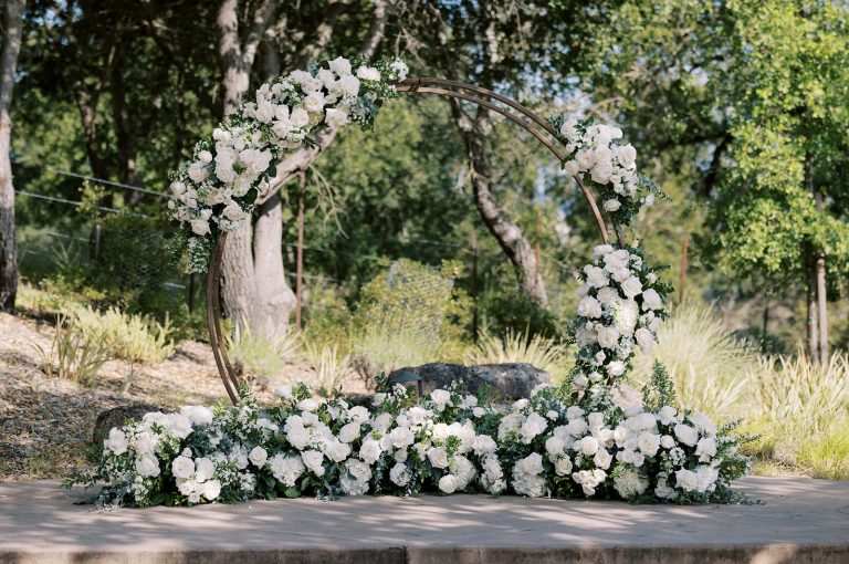 Circular arbor decorated with white florals